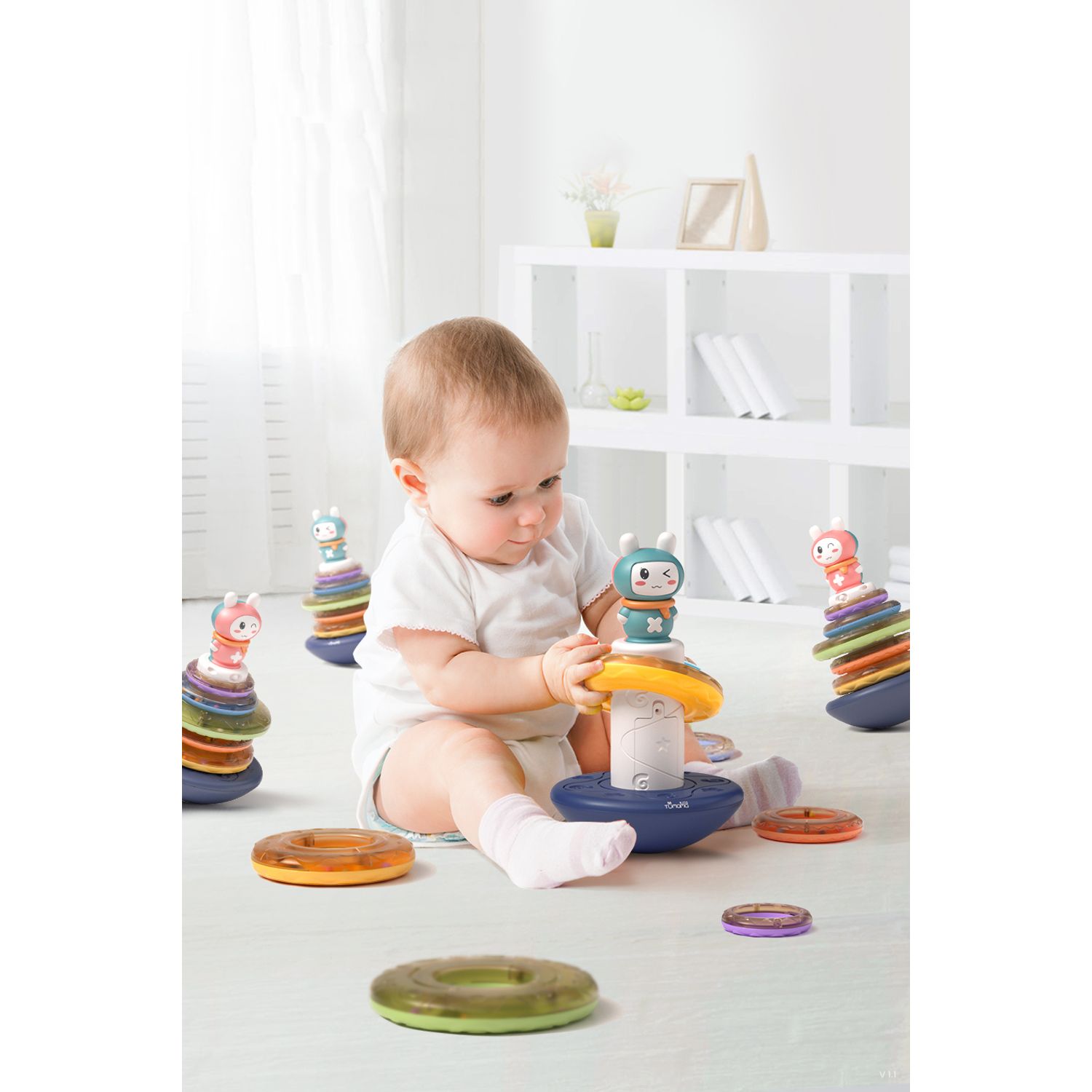 Jucarie muzicala interactiva zornaitoare 3 in 1, tip piramida, 5 cercuri multicolore, design Iepuras, Tumama&reg;, multicolor fotografia produsului View 4 L