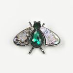 Brosa insecta cu piatra verde fotografia produsului