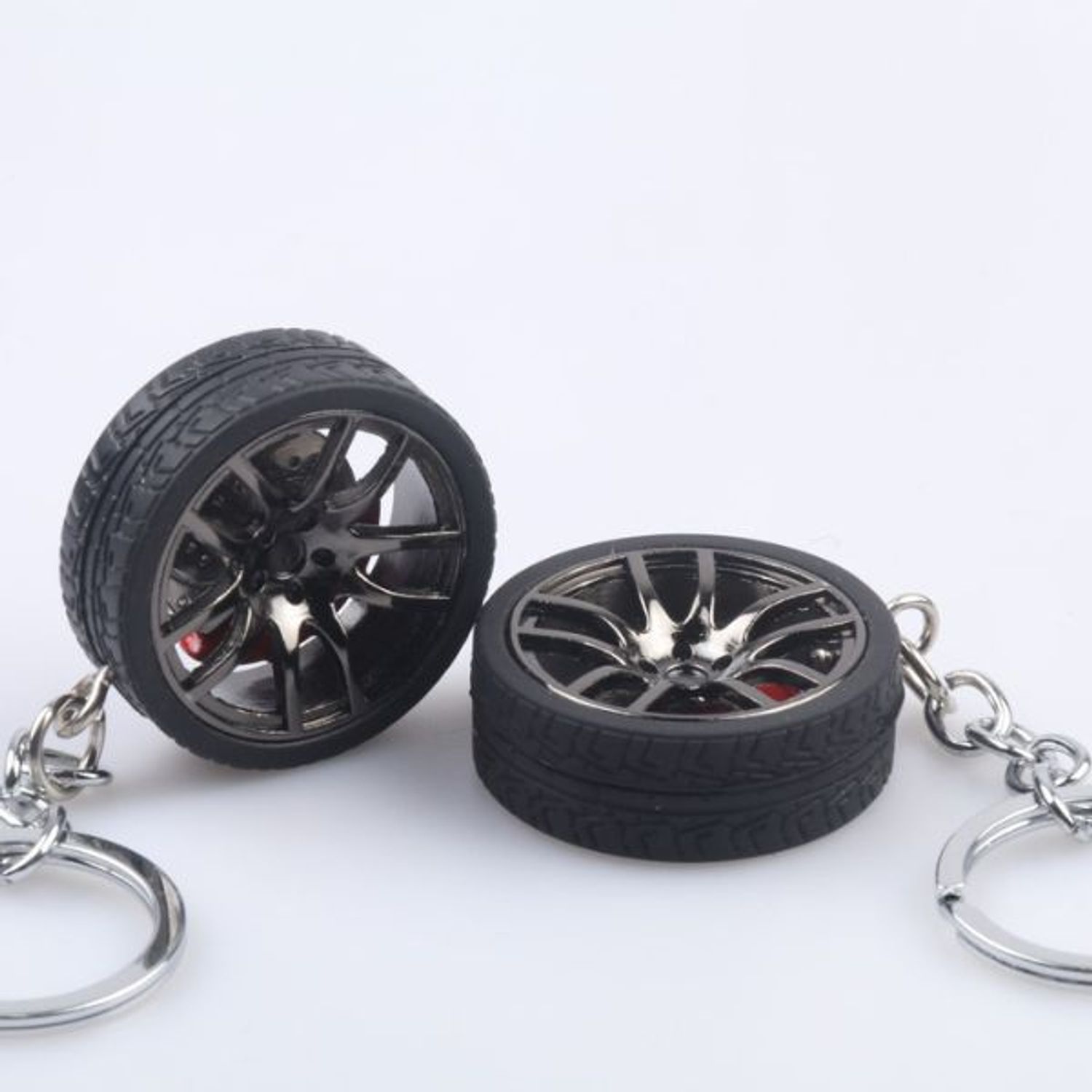 Breloc metalic anticoroziv, model roata auto, Negru fotografia produsului View 3 L