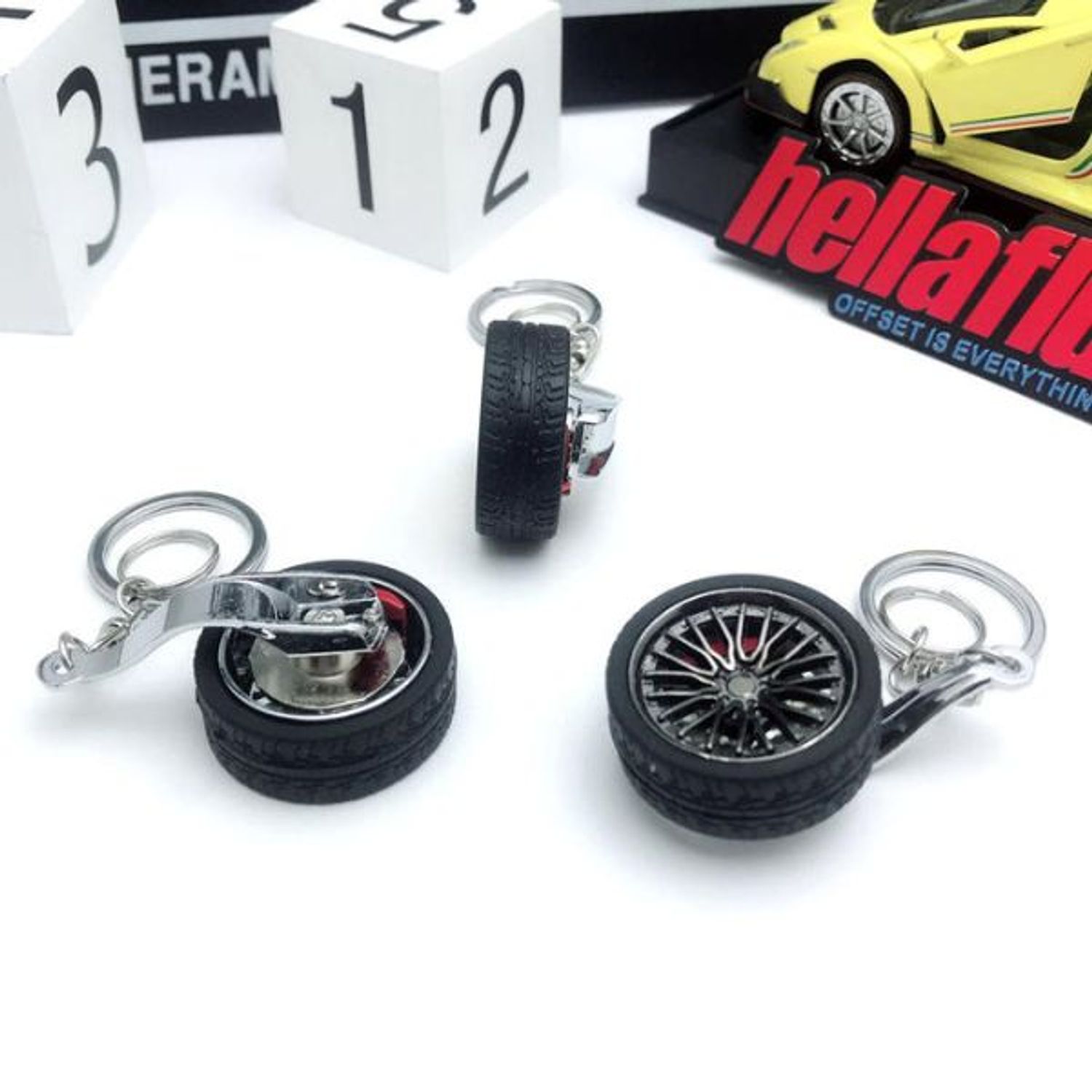 Breloc metalic anticoroziv, model roata auto, Negru fotografia produsului View 6 L